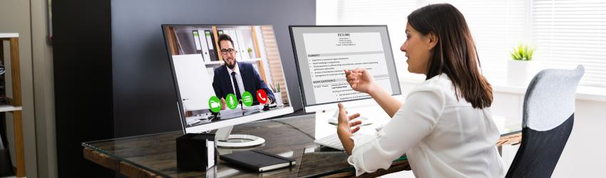 Hiring manager conducting an virtual interview with a job applicant