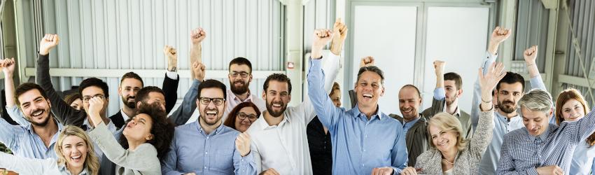 Team celebrating a recent organizational milestone